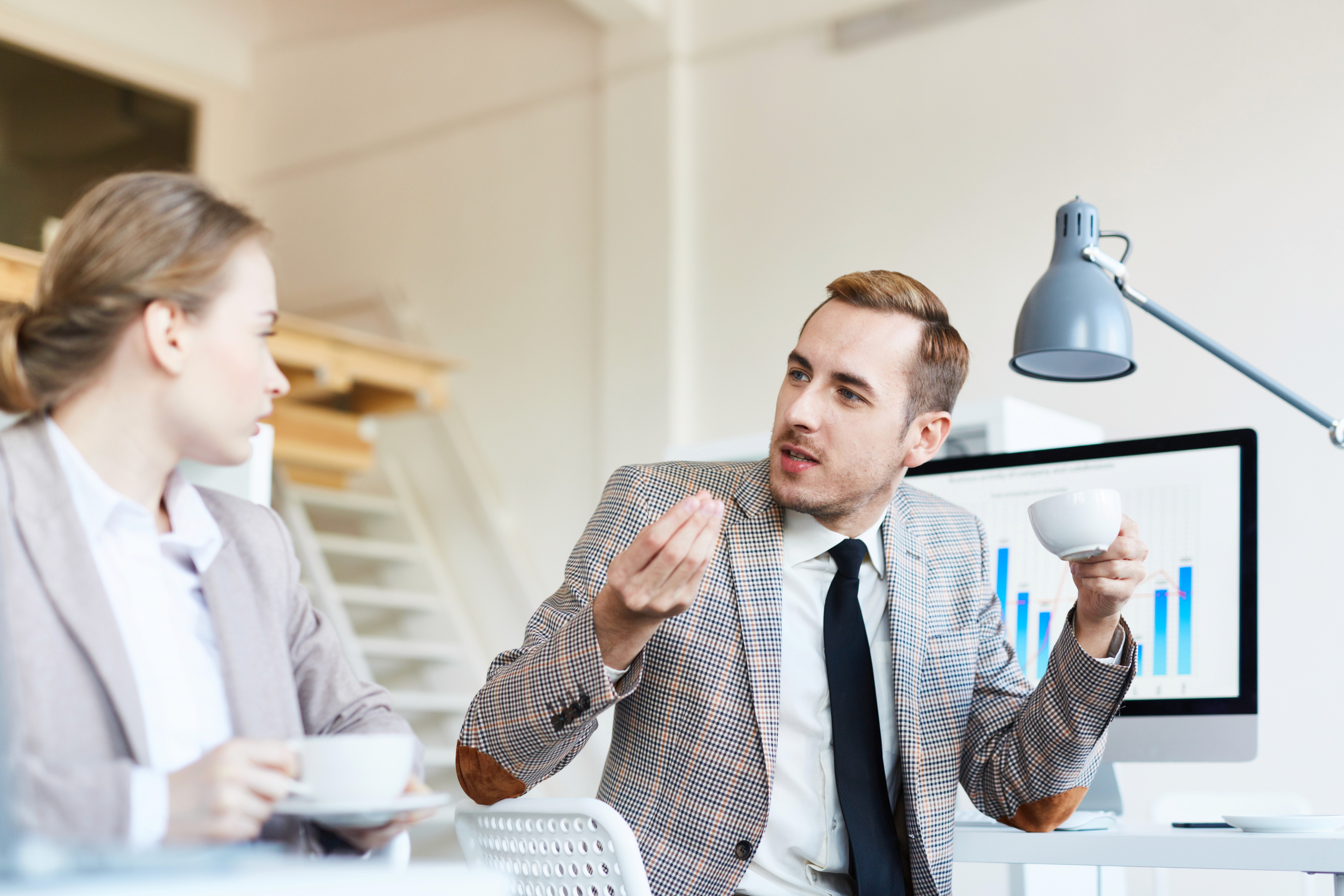 2 people arguing at the office